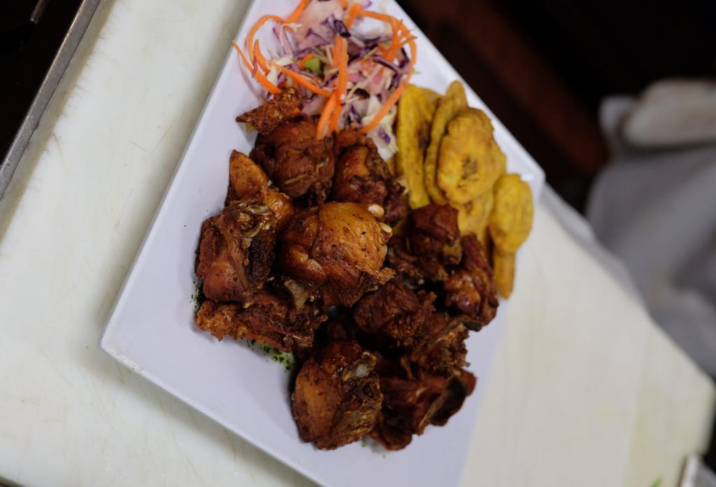 Chicharones de Pollo · Irresistible pieces of bone-in fried chicken. Served with your choice of side.