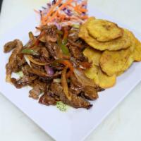 Filetillo de Res · Sauteed steak strips with peppers and onions. Served with your choice of side.