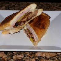 Cubano Sandwich  · Delicious roast pork, ham, and Swiss cheese. Taste great with pickles but thats up to you!Pl...