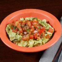 Guacamole Dip · Mashed avocado, fresh tomatoes, onions and cilantro. Very famous.
