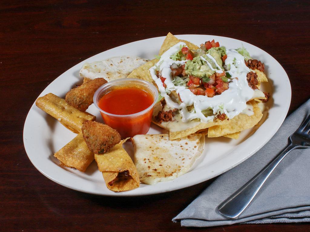 Sampler of Mexican Favorites · Cheese quesadillas, mini chicken taquitos, beef nachos and served with guacamole, sour cream and pico de gallo.