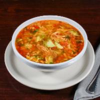Chicken Soup · A delicious chicken broth, with shredded chicken and rice, topped with fresh cilantro and on...