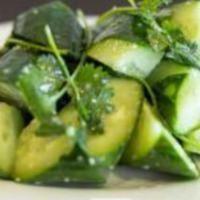 Garlic Cucumber Salad · Cucumber mixed with dressing. 