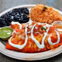 Enchiladas · 2 white corn tortilla enchiladas filled with cheese, your choice of protein, and either Chil...