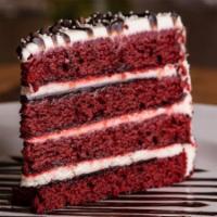 Red Velvet Cake · Red velvet cake layered with chocolate ganache  filling, and frosted with a tangy cream chee...