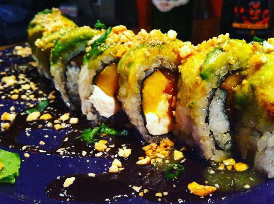 Crazy Monkey · Smoked salmon, cream cheese, mango covered with avocado, eel sauce and peanuts.