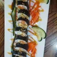 Franklin Roll · Salmon, crab, tampico paste, avocado and cream cheese covered with seaweed and eel sauce.