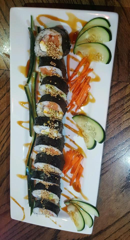 Franklin Roll · Salmon, crab, tampico paste, avocado and cream cheese covered with seaweed and eel sauce.