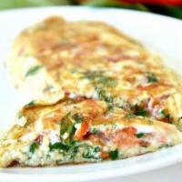 Veggie Omelette · Tomatoes, mushrooms, onion, green peppers. Served with home fries and choice of toast.5eggs