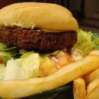 Falafel Burger · Lettuce, red onion and tomatoes. Served with french fries.