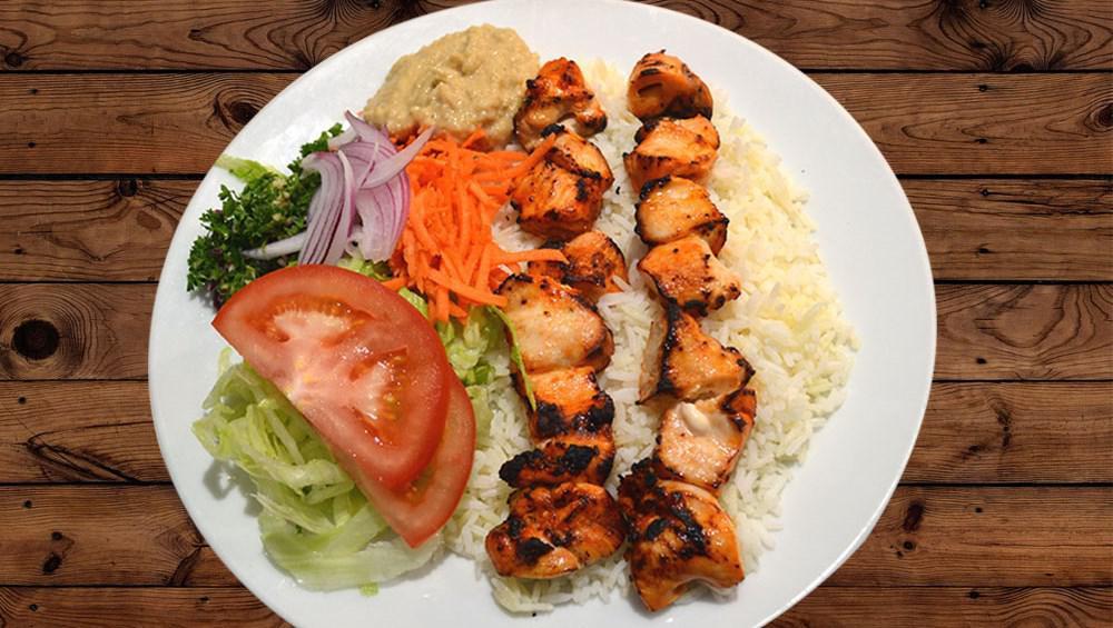 Chicken Kebab · Marinated chicken grilled served with FRENCH FRIES and house salad.