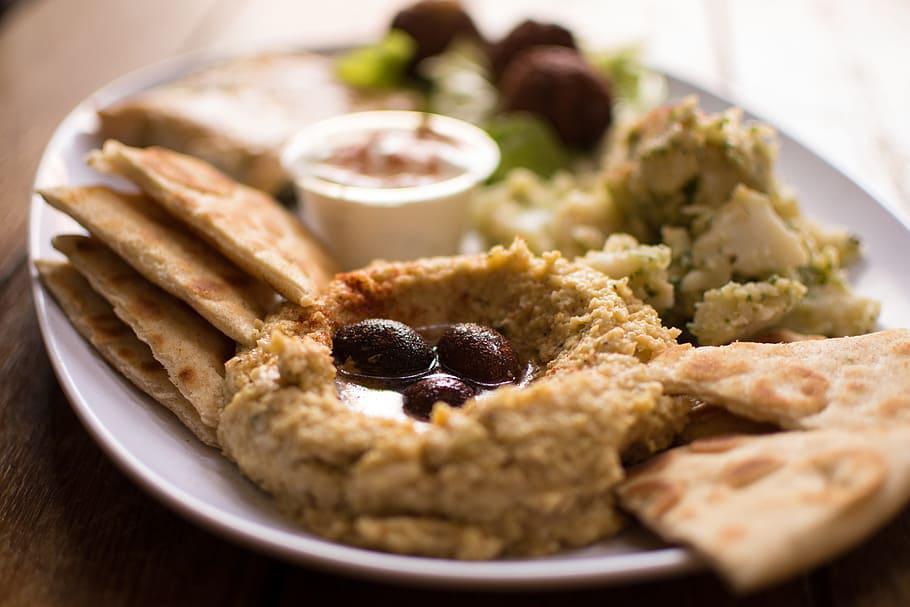 Falafel with Hummus Dip · Fried ball of ground chickpeas.