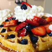 Belgian Waffle · Fluffy waffle, dusted with powdered sugar and syrup. Add seasonal berries and whipped cream ...