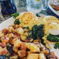 Florentine Benedict · 2 poached eggs, sauteed spinach, and an English muffin topped with a rich hollandaise sauce ...
