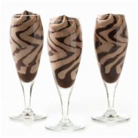 Hazelnut Chocolate Flute · Smooth hazelnut gelato swirled with rich chocolate sauce presented in a flute glass

