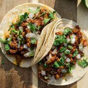 Al Pastor Taco · Homemade tender pork in a sweet and savory marinade that is grilled to perfection. The tacos...