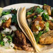 Carnitas Taco · Authentic and cooked in the JJ'S CASA, Homemade Pork Carnitas, topped with chopped cilantro ...