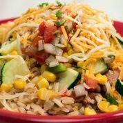 Roasted Corn and Zucchini Bowl · Our famous bowls layered with roasted corn and zucchini cooked to perfection, cilantro lime ...