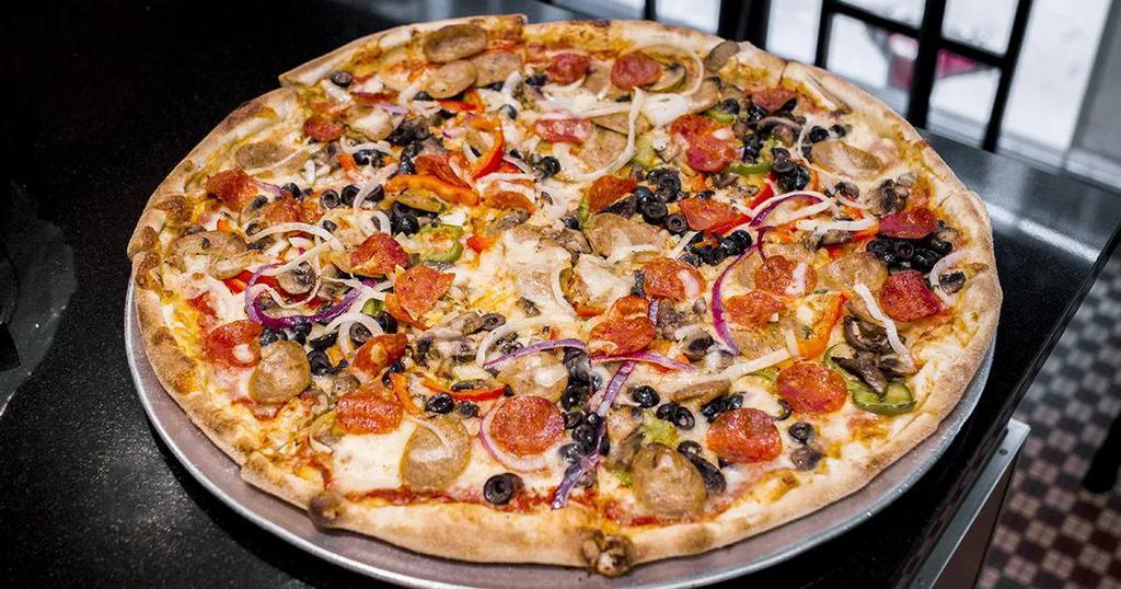 Supreme Pizza · Onions, peppers, mushrooms, sausage and pepperoni.
