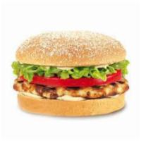 Grilled Chicken Burger · Deluxe platter includes lettuce, tomatoes, french fries, and pickles.