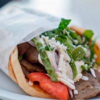 Greek Gyro Wrap · Gyro with Greek salad and tzatziki sauce. Deluxe platter served with french fries or house s...