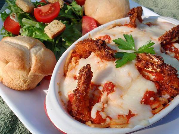 Eggplant Parmesan · Served with salad, bread and Parmesan cheese and choice of pasta.