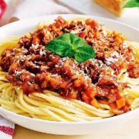 Pasta Bolognese · Served with salad, bread and Parmesan cheese and choice of pasta.
