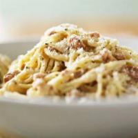 Linguini Carbonara · Served with salad, bread and Parmesan cheese and choice of pasta.