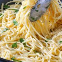 Spaghetti with Garlic Sauce · Served with salad, bread and Parmesan cheese and choice of pasta.