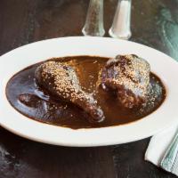 Mole Poblano · Chicken in a traditional spicy pueblan chocolate-mole sauce.