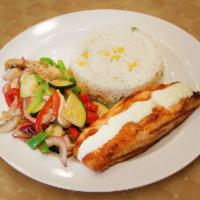 Grilled Salmon · Served with rice and sauteed vegetables.
