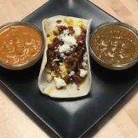 Beef, Egg and Cheese Tacos · Tender, marinated sirloin beef mixed with fluffy eggs, topped with queso fresco served in a ...