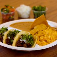 3 Tacos Combo · Tacos are prepared with your choice of meat, onions, and cilantro. Served with rice and beans.