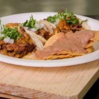 Tacos - A la Carte · Prepared with your choice of protein with onions and cilantro.