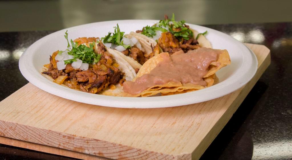 Tacos - A la Carte · Prepared with your choice of protein with onions and cilantro.