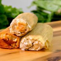 Tamales · Corn-based dough wrapped in a corn husk and steamed and filled with your choice of meat.