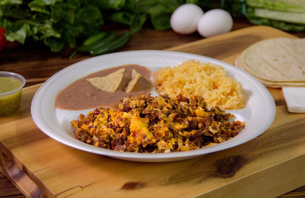 Chorizo Con Huevo Combo · Eggs scrambled with chorizo dry-cured sausage, rice, and beans and a side of tortillas.