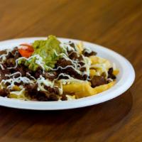 Fries · They prepared with your choice of protein, beans, guacamole, sour cream, and Cotija cheese.