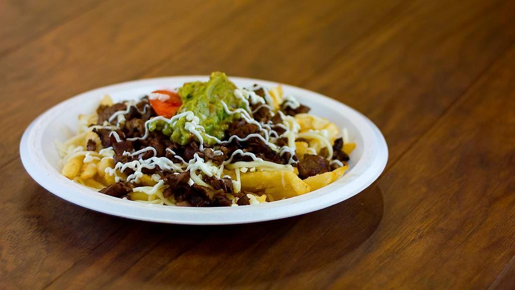 Fries · They prepared with your choice of protein, beans, guacamole, sour cream, and Cotija cheese.