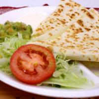 Cheese Quesadilla · Simple Cheese and flour tortilla.  Served with sour cream and guacamole.