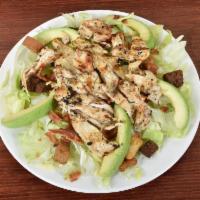 California Salad · Grilled chicken, romaine, avocado, bacon bits and croutons. Comes with choice of dressing.