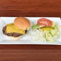 6 oz. Flamed Broil Cheeseburger · Served on a burger bun with American cheese, lettuce, tomatoes, pickles and onions.