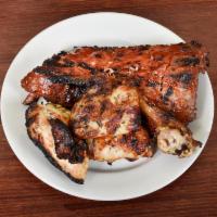 1/4 Chicken and Ribs with 2 Sides · White or dark chicken meat.
