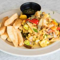 Ackee Breakfast · Sauteed codfish, onions, peppers, thyme and fresh garlic. Served with yucca fries.