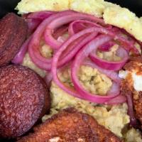Tres Golpe · Fried Tropical Cheese, Salami, 2 Eggs any style and Sauteed Onions served with Mangu ( seaso...