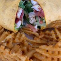 Honey Chicken Wrap · Turkey bacon, lettuce, tomato and honey mustard. Wrapped in a yellow tortilla. Served with w...