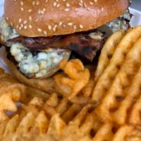 Blue Cheese Burger · Caramelized onion, crumbled blue cheese, bacon and waffle fries. 1/2 lb Angus ground beef.