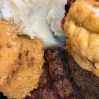 Surf and Turf · 5 oz. lobster tail and 12 oz. sirloin steak.