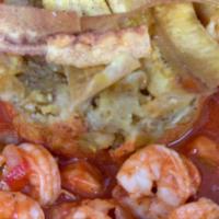 Mofongo with Baby Shrimp · Onion, pepper and tomato sauce in a fried plantain shell.