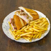 Cuban Sandwich Combo · Cubano sandwich. Ham, pulled pork, Swiss cheese, and mayo ketchup, lettuce, and tomato. Fren...